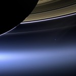 In this rare image taken on July 19, 2013, the wide-angle camera on NASA's Cassini spacecraft has captured Saturn's rings and our planet Earth and its moon in the same frame. It is only one footprint in a mosaic of 33 footprints covering the entire Saturn ring system (including Saturn itself). At each footprint, images were taken in different spectral filters for a total of 323 images: some were taken for scientific purposes and some to produce a natural color mosaic. This is the only wide-angle footprint that has the Earth-moon system in it. Image credit: NASA/JPL-Caltech/Space Science Institute