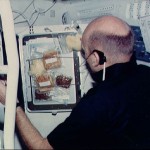 Pilot Fullerton prepares meal on middeck