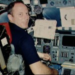 Commander Lousma recieves FDF procedures on forward flight deck