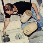 Commander Lousma replaces ARS LiOH cannisters on middeck