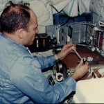 Commander prepares glass columns for electrophoresis experiment