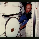 Commander Lousma adjusts MLR controls on middeck