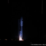An Atlas V rocket thunders into the night-time sky carrying the AEHF-3 satellite for the U.S. Air Force. Photo Credit: Matthew Travis / Zero-G News
