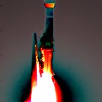 An Atlas V rocket thunders into the night-time sky carrying the AEHF-3 satellite for the U.S. Air Force. Photo Credit: Matthew Travis / Zero-G News