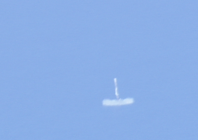 11_c439042b-ee14-45c7-aa50-6f0f6396b0db The Falcon 9 first stage with one Merlin engine still firing kicks up water as it descends about 3 meters above the surface of the Pacific Ocean. Credit: SpaceX