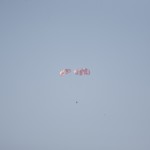 The SpaceX main parachutes control the descent of the Dragon test article following a drop test over the Pacific Ocean, off the coast of Morro Bay, Calif. Image Credit: NASA/Kim Shiflett