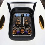 A look through the open hatch of the Dragon V2 reveals the layout and interior of the seven-crew capacity spacecraft. SpaceX unveiled the new spacecraft during a ceremony at its headquarters in Hawthorne, Calif. The Dragon V2 is designed to carry people into Earth's orbit and was developed in partnership with NASA's Commercial Crew Program under the Commercial Crew Integrated Capability agreement. SpaceX is one of NASA's commercial partners working to develop a new generation of U.S. spacecraft and rockets capable of transporting humans to and from Earth's orbit from American soil. Ultimately, NASA intends to use such commercial systems to fly U.S. astronauts to and from the International Space Station. Photo credit: NASA/Dimitri Gerondidakis