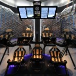 A look through the open hatch of the Dragon V2 reveals the layout and interior of the seven-crew capacity spacecraft. SpaceX unveiled the new spacecraft during a ceremony at its headquarters in Hawthorne, Calif. The Dragon V2 is designed to carry people into Earth's orbit and was developed in partnership with NASA's Commercial Crew Program under the Commercial Crew Integrated Capability agreement. SpaceX is one of NASA's commercial partners working to develop a new generation of U.S. spacecraft and rockets capable of transporting humans to and from Earth's orbit from American soil. Ultimately, NASA intends to use such commercial systems to fly U.S. astronauts to and from the International Space Station. Photo credit: NASA/Dimitri Gerondidakis