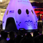 The Dragon V2 stands on a stage inside SpaceX headquarters in Hawthorne, Calif., during its unveiling ceremony. The spacecraft is designed to carry people into Earth's orbit and was developed in partnership with NASA's Commercial Crew Program under the Commercial Crew Integrated Capability agreement. SpaceX is one of NASA's commercial partners working to develop a new generation of U.S. spacecraft and rockets capable of transporting humans to and from Earth's orbit from American soil. Ultimately, NASA intends to use such commercial systems to fly U.S. astronauts to and from the International Space Station. Photo credit: NASA/Dimitri Gerondidakis