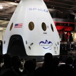 The Dragon V2 stands on a stage inside SpaceX headquarters in Hawthorne, Calif., during its unveiling ceremony. The spacecraft is designed to carry people into Earth's orbit and was developed in partnership with NASA's Commercial Crew Program under the Commercial Crew Integrated Capability agreement. SpaceX is one of NASA's commercial partners working to develop a new generation of U.S. spacecraft and rockets capable of transporting humans to and from Earth's orbit from American soil. Ultimately, NASA intends to use such commercial systems to fly U.S. astronauts to and from the International Space Station. Photo credit: NASA/Dimitri Gerondidakis